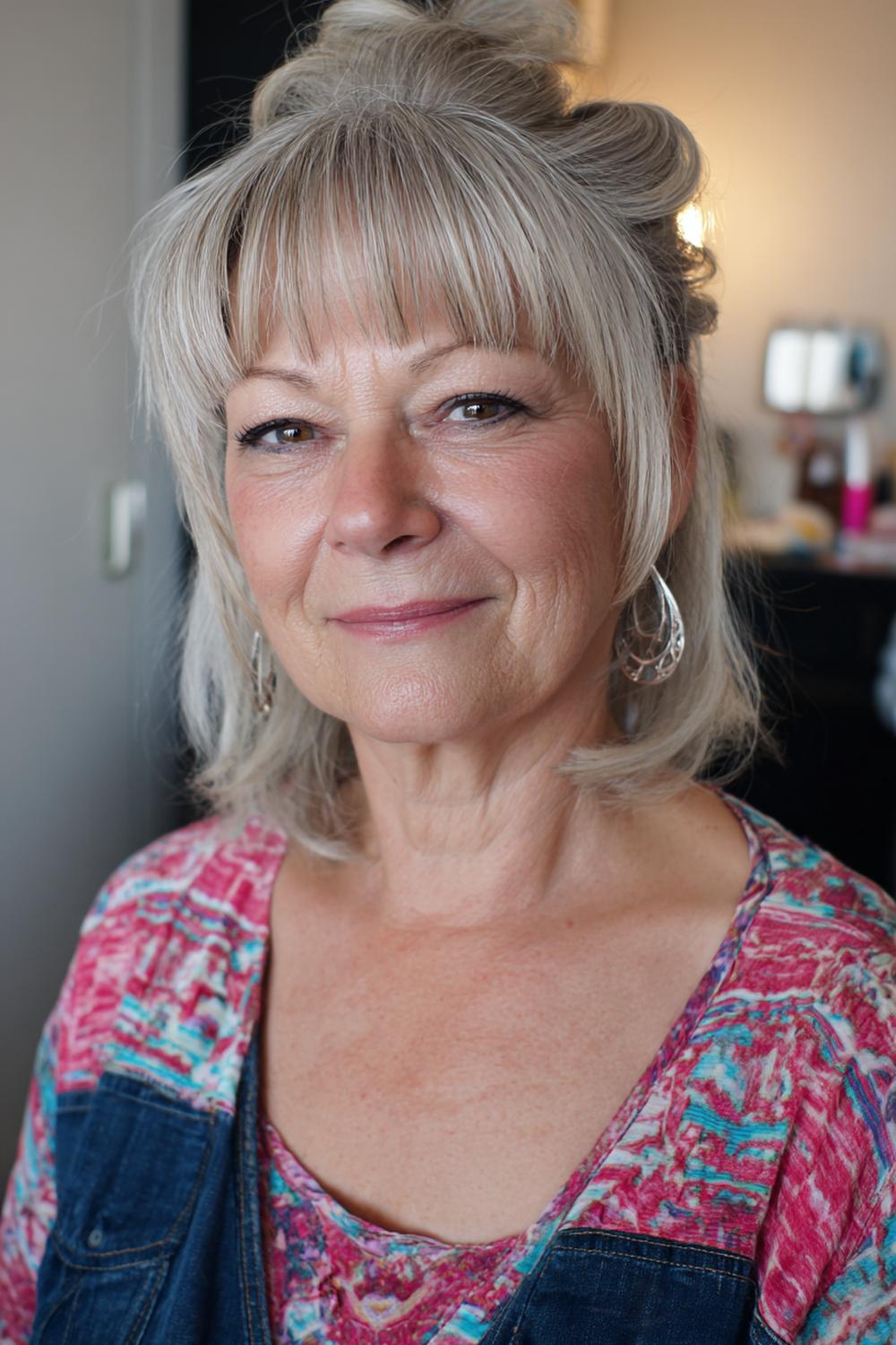 18. Kapsel met pony voor 50 plus: laagjesbob met pony en zachte outturned punten