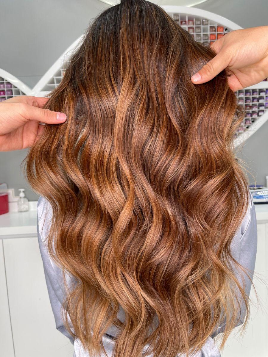 Koper haar gouden highlights