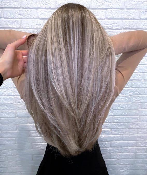 Lang aschblond haar kapsel