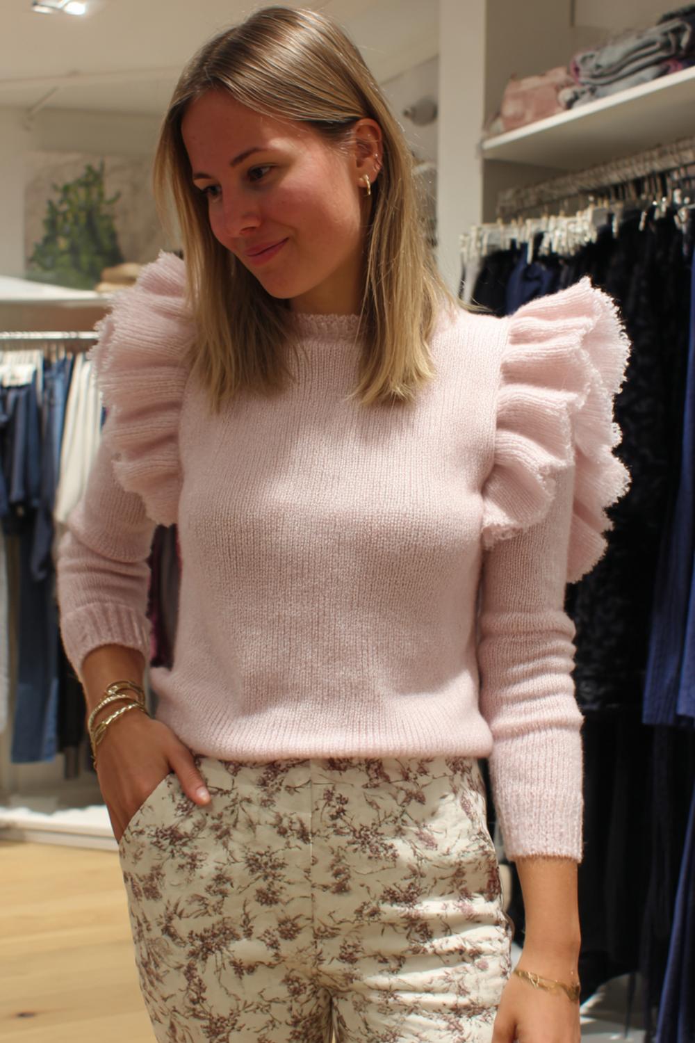 11. Tijdloze schouderlange snit met gelaagde punten en soepele beweging